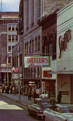 Butler's Shoe Store around 1950. Detail from postcard.